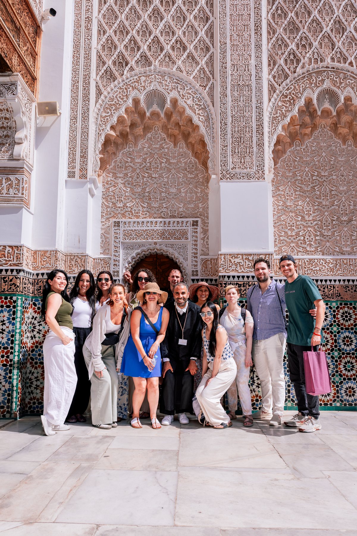 Abd Errahman with travelers in a Moroccan palace