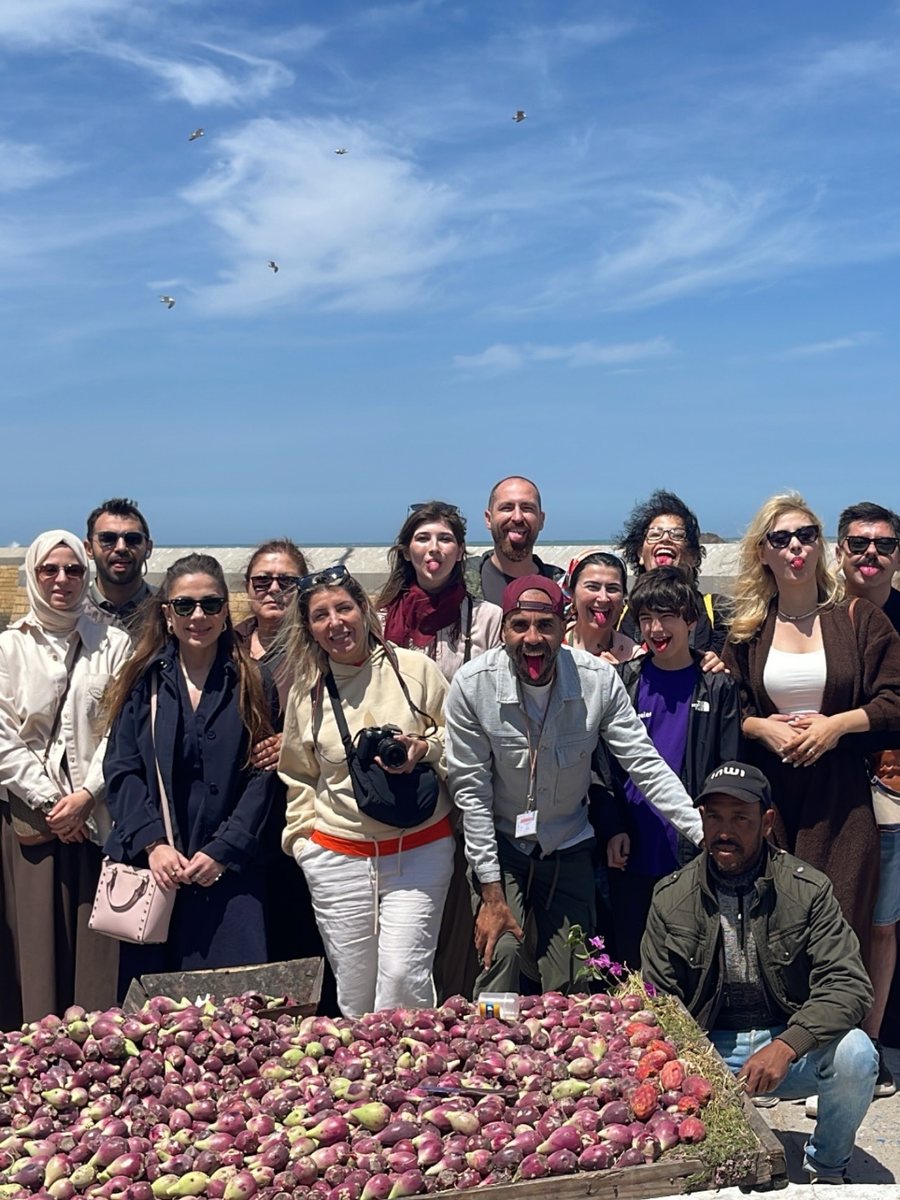 Travelers enjoying a rooftop view in Morocco