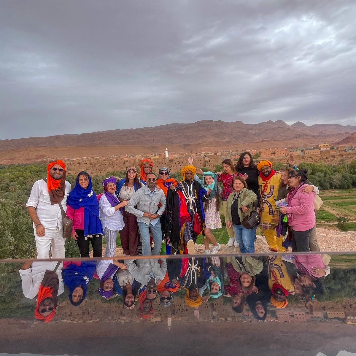 Travel group near an Atlas landscape viewpoint